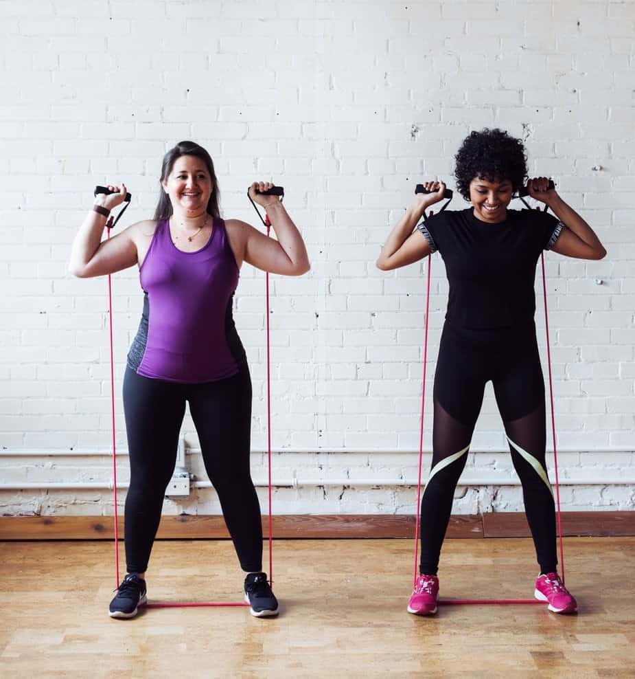 two women exercising fitness